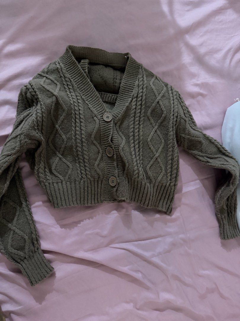 Brown Cable Knit Cropped Cardigan Set (Category: Coats, Jackets and Outerwear) located in Marikina City. Submitted by feibella_clothing24 (Listing ID 1462511699, Image 1). Description: - Browncable knit cardigan set - Cropped style with button-up front - Includes matching inner camisole - Perfect for layering or standalone wear - Made from soft and cozy knit material - with top included.