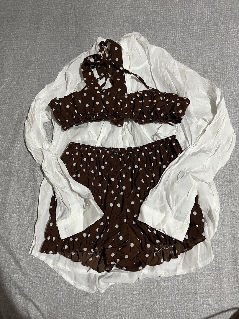 Brown polka dot set (Category: Bikinis & Swimsuits) located in Manila. Submitted by az0r_ (Listing ID 1462505498, Image 2). Description: - Cute brown polka dot bikini set - Includes halter top and ruffled shorts - Comes with a matching white button-up shirt - Lightweight and flowy fabric - Ideal for beach days and summer vibes.