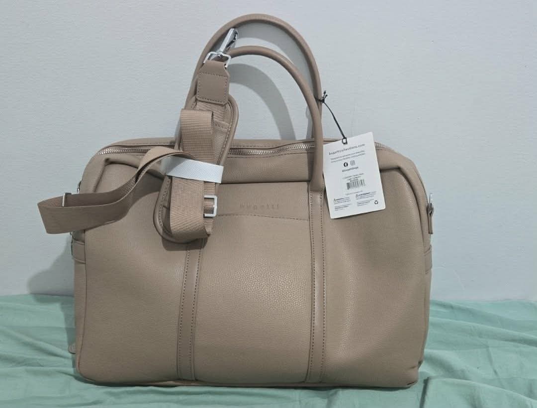 Bugatti Logan Collection Duffel Bag - Taupe (Category: Luxury Bags & Wallets) located in Manila. Submitted by a_angels (Listing ID 1462603024, Image 1). Description: This is a Bugatti Pure Collection executive briefcase in Taupe, model EXB2529BU-TAUPE. The exact model cost 100$ ✨ BRAND NEW Bugatti Pure Collection Briefcase ✨ Elegant Taupe color — perfect for work, business, school, or travel. ✅ Genuine Bugatti Collections ✅ Model: EXB2529BU-TAUPE