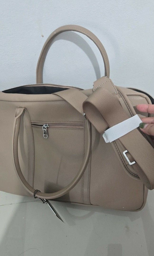 Bugatti Logan Collection Duffel Bag - Taupe (Category: Luxury Bags & Wallets) located in Manila. Submitted by a_angels (Listing ID 1462603024, Image 3). Description: This is a Bugatti Pure Collection executive briefcase in Taupe, model EXB2529BU-TAUPE. The exact model cost 100$ ✨ BRAND NEW Bugatti Pure Collection Briefcase ✨ Elegant Taupe color — perfect for work, business, school, or travel. ✅ Genuine Bugatti Collections ✅ Model: EXB2529BU-TAUPE