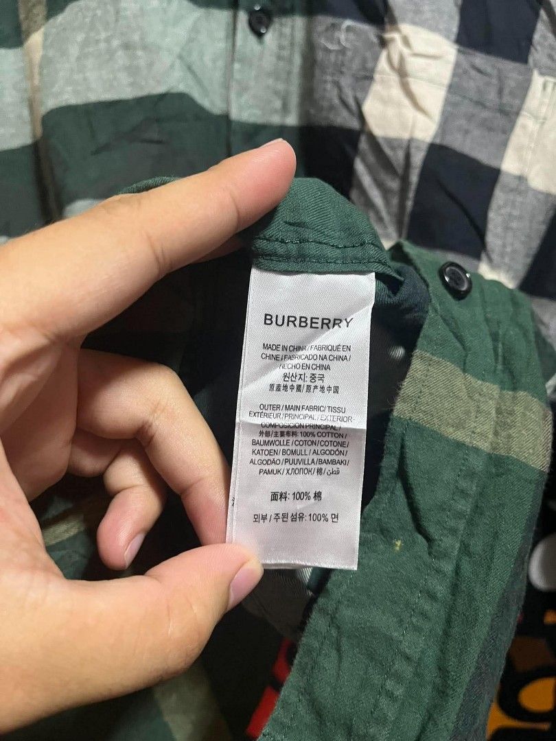 Burberry (Category: Tshirts & Polo Shirts ) located in Taguig. Submitted by bimbyanche19839 (Listing ID 1462608843, Image 3). Description: Burberry Polo Button Down Size: Large Width: 22 Length: 29 Color Rate: 9.5/10 Good Condition No flaws 🏷️ 📍Taguig Location.