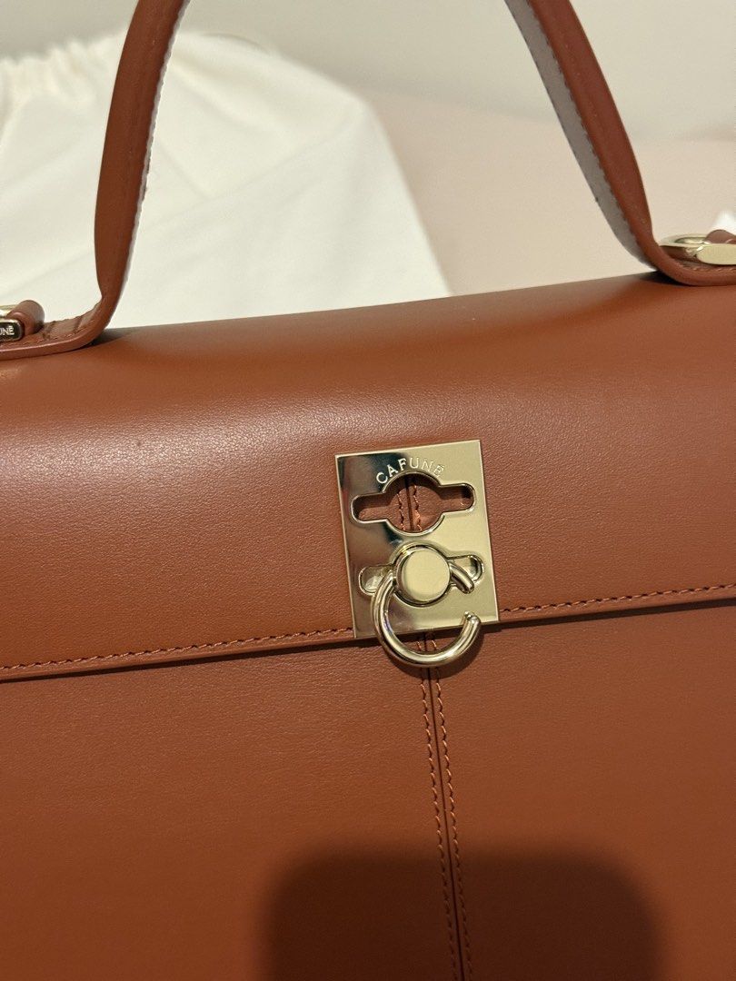 Cafune Stance Bag in Terracotta (Category: Luxury Bags & Wallets) located in Taguig. Submitted by kirei.retro (Listing ID 1462595445, Image 3). Description: 𝐂𝐚𝐟𝐮𝐧𝐞 𝐒𝐭𝐚𝐧𝐜𝐞 𝐁𝐚𝐠 𝐢𝐧 𝐓𝐞𝐫𝐫𝐚𝐜𝐨𝐭𝐭𝐚 🏷️₱𝟓𝟐,𝟎𝟎𝟎 - comes complete with dust bag, strap, bag charm, and authenticity certificate - never used, just kept in storage - currently retail price is ₱56,900.