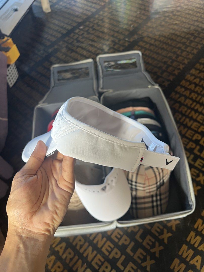 Callaway White Golf Visor with Perforated Detail (Category: Caps & Hats) located in Davao. Submitted by dubdabi.co (Listing ID 1462461870, Image 3). Description: - White Callaway golf visor - Perforated detailing on the front panel - Adjustable strap for a comfortable fit - Ideal for sunny days on the golf course - Classic and simple design.