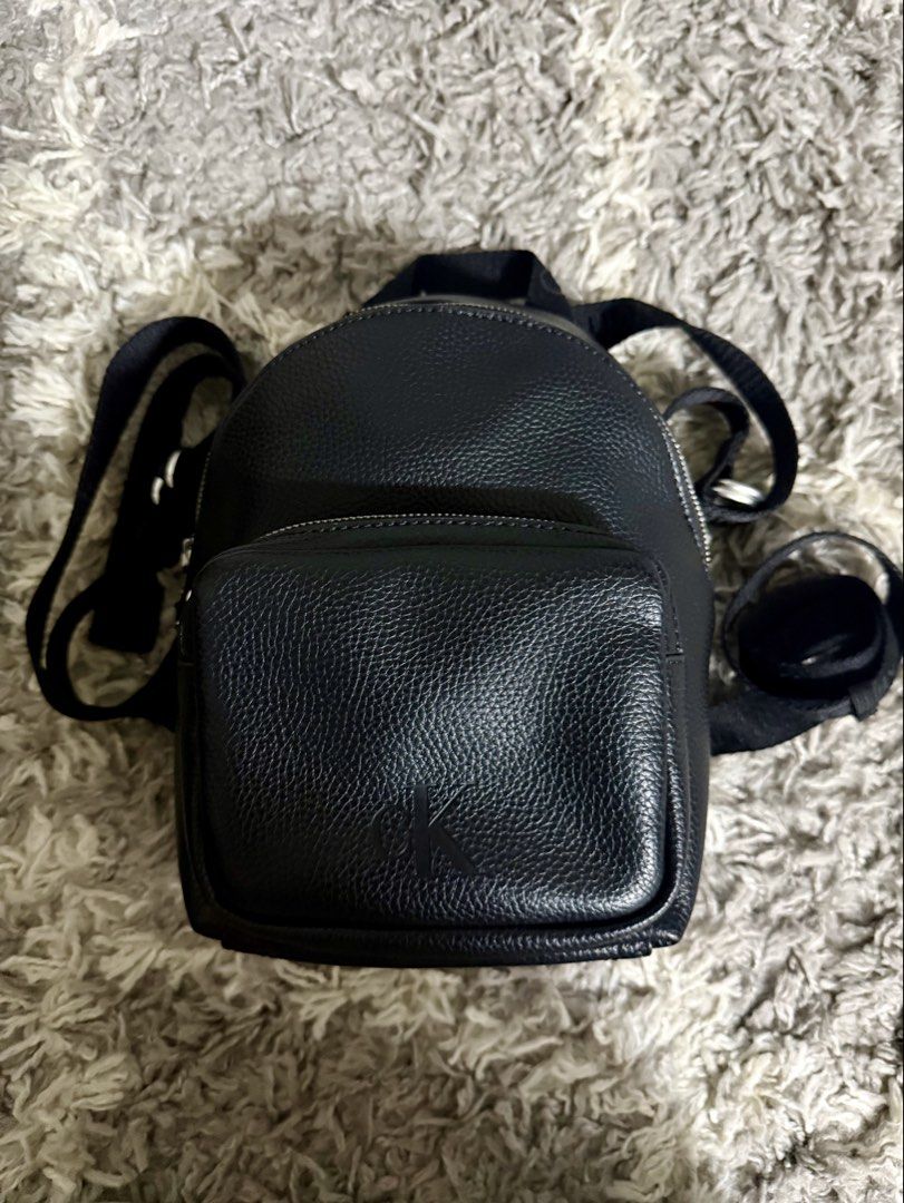 Calvin Klein Black Leather Mini Backpack (Category: Backpacks) located in Pasig City. Submitted by janiecruzaban (Listing ID 1462478144, Image 2). Description: - I bought it in Japan - 100% Authentic Black Calvin Klein Mini Backpack - use only once - Genuine Pebbled Leather Exterior - Interior Calvin Klein Logo Patch - Adjustable Straps with Calvin Klein Branding - Secure Zipped Compartment - Ideal for Everyday Use.