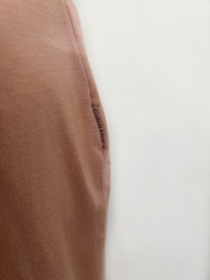 Calvin Klein Muted Peach Pajama Pants (Category: Undergarments & Loungewear) located in Quezon City. Submitted by cooroe.mnl (Listing ID 1462543003, Image 3). Description: S-L (stretchy fabric) Waist 28-34, length 38 9.9/10 (has stain).