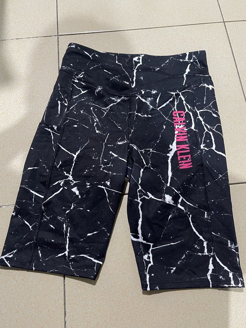 Calvin Klein Performance Biker Shorts M/M Marble Print (Category: Activewear) located in Manila. Submitted by tineferna08917 (Listing ID 1462459238, Image 3). Description: - Calvin Klein Performance biker shorts - Color: Black with white marble print - Features: Pink logo on the side, side pockets - Size: M/M - Origin: Made in Sri Lanka.