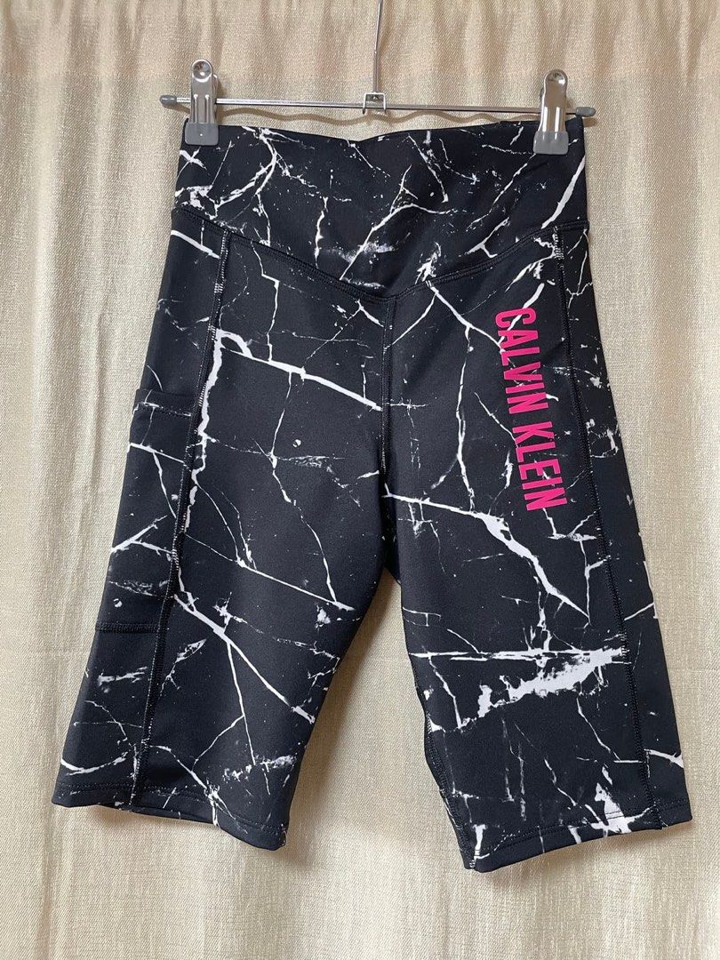 Calvin Klein Performance Biker Shorts M/M Marble Print (Category: Activewear) located in Manila. Submitted by tineferna08917 (Listing ID 1462459238, Image 1). Description: - Calvin Klein Performance biker shorts - Color: Black with white marble print - Features: Pink logo on the side, side pockets - Size: M/M - Origin: Made in Sri Lanka.