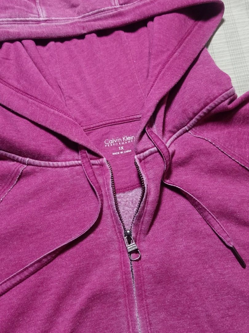 Calvin Klein Performance Pink Zip-Up Hoodie (Category: Coats, Jackets and Outerwear) located in Pasay City. Submitted by jay_gdz (Listing ID 1462594698, Image 3). Description: Calvin Klein Washed Full-Zip Hoodie Dimes: 26W x 27L Excellent Condition Embroidered Logo 10/10 Color Rate No issue.