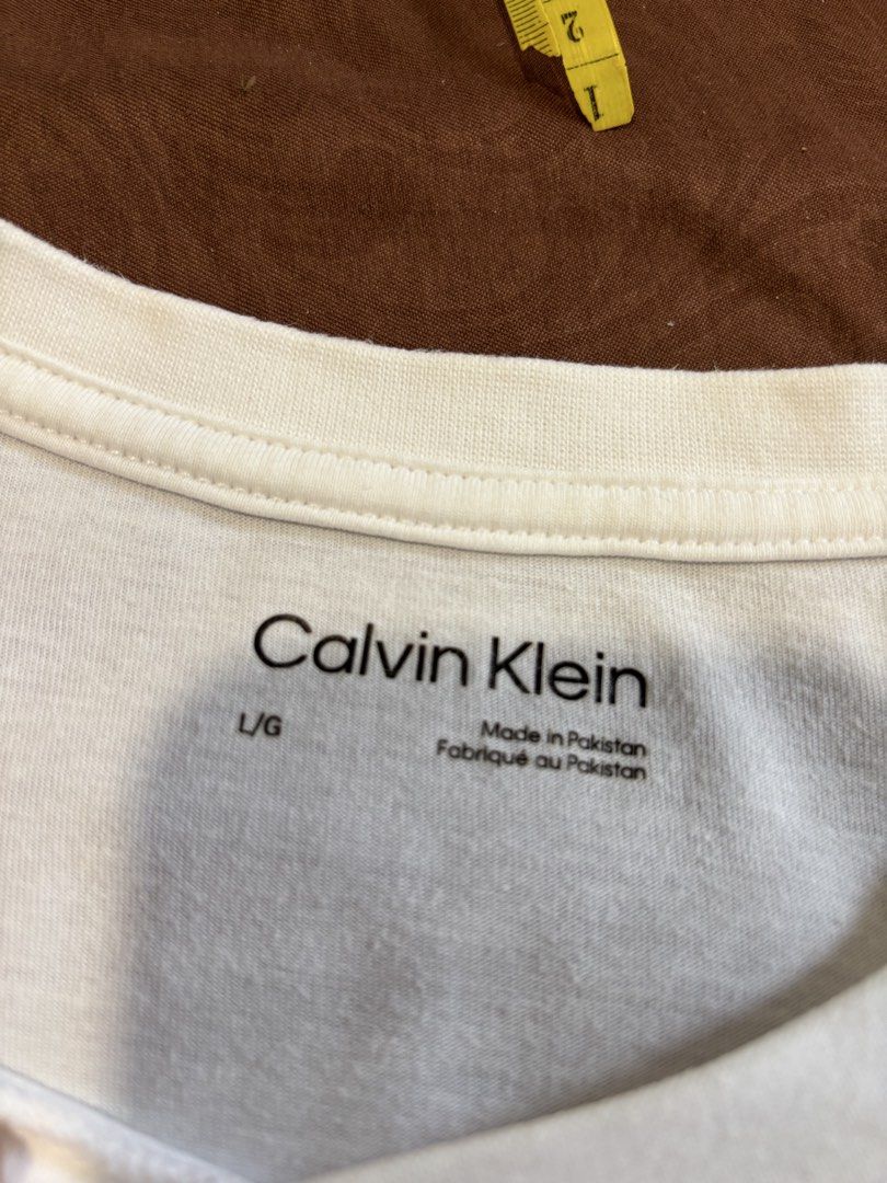 Calvin Klein shirt (Category: Tshirts & Polo Shirts ) located in Davao. Submitted by hippiehappy420 (Listing ID 1462582517, Image 2). Description: Ck shirt Large Very good condition Washed and sanitized ship nationwide Negotiable price Visit my listings for more affordable clothings! Shirt Pants Shorts Caps Bags Jogger Blouse Jeans Hoodies Accessories Etc..