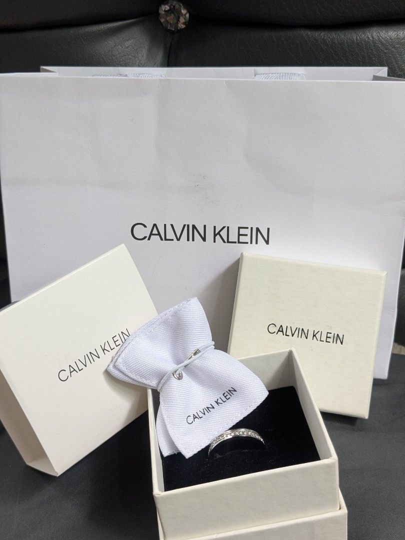 Calvin Klein Swarovski Crystals Ring (Category: Earrings) located in Quezon City. Submitted by nnncorner (Listing ID 1462589798, Image 3). Description: Calvin Klein Swarovski Crystals Ring 100% original Complete Set L9 size / Size 9 / 63-65 mm 5,980 original price in pesos Rfs: I lose weight, it fits but loose in my finger. Selling it for 3,000.