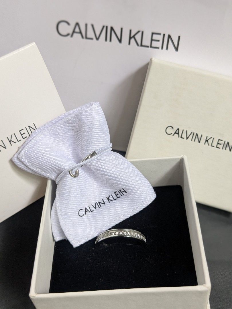 Calvin Klein Swarovski Crystals Ring (Category: Earrings) located in Quezon City. Submitted by nnncorner (Listing ID 1462589798, Image 2). Description: Calvin Klein Swarovski Crystals Ring 100% original Complete Set L9 size / Size 9 / 63-65 mm 5,980 original price in pesos Rfs: I lose weight, it fits but loose in my finger. Selling it for 3,000.