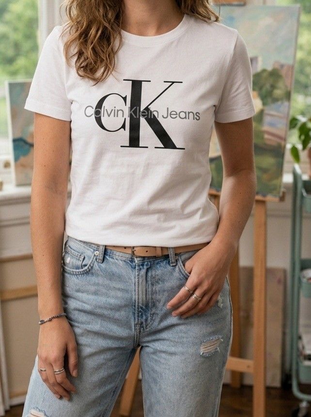 [Calvin Klein] White T-shirt (Size S) (Category: Shirts) located in Makati City. Submitted by skyioh (Listing ID 1457209612, Image 1). Description: 💯 - CK STORE BOUGHT (NOT THRIFTED) - Features iconic CK logo graphic on the front (EMBROIDERES) - Size: S ( can fit Male XS to S ) -MY SIZE < see photo > ❤️height : 163cm / 5'3" ❤️size : medium - Material: Comfortable cotton NO ISSUE / IMPULSE BUY 📌Location : Makati 📌Payment : Gcash 📌Shipping : on