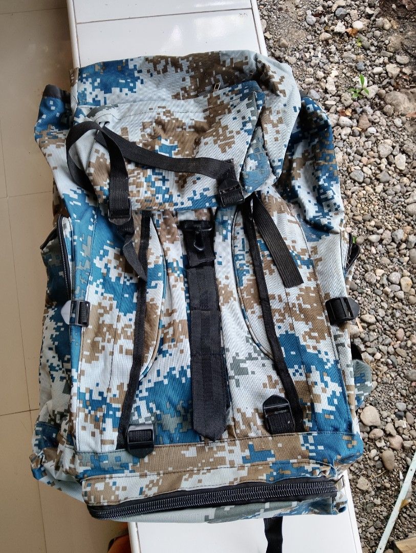 Camouflage Backpack (Category: Backpacks) located in General Santos City (Dadiangas). Submitted by rjb21 (Listing ID 1450649243, Image 1). Description: - Durable camouflage backpack - Main compartment with secure drawstring closure - Multiple external pockets for easy organization - Comfortable padded shoulder straps - Ideal for hiking adventures or travel.