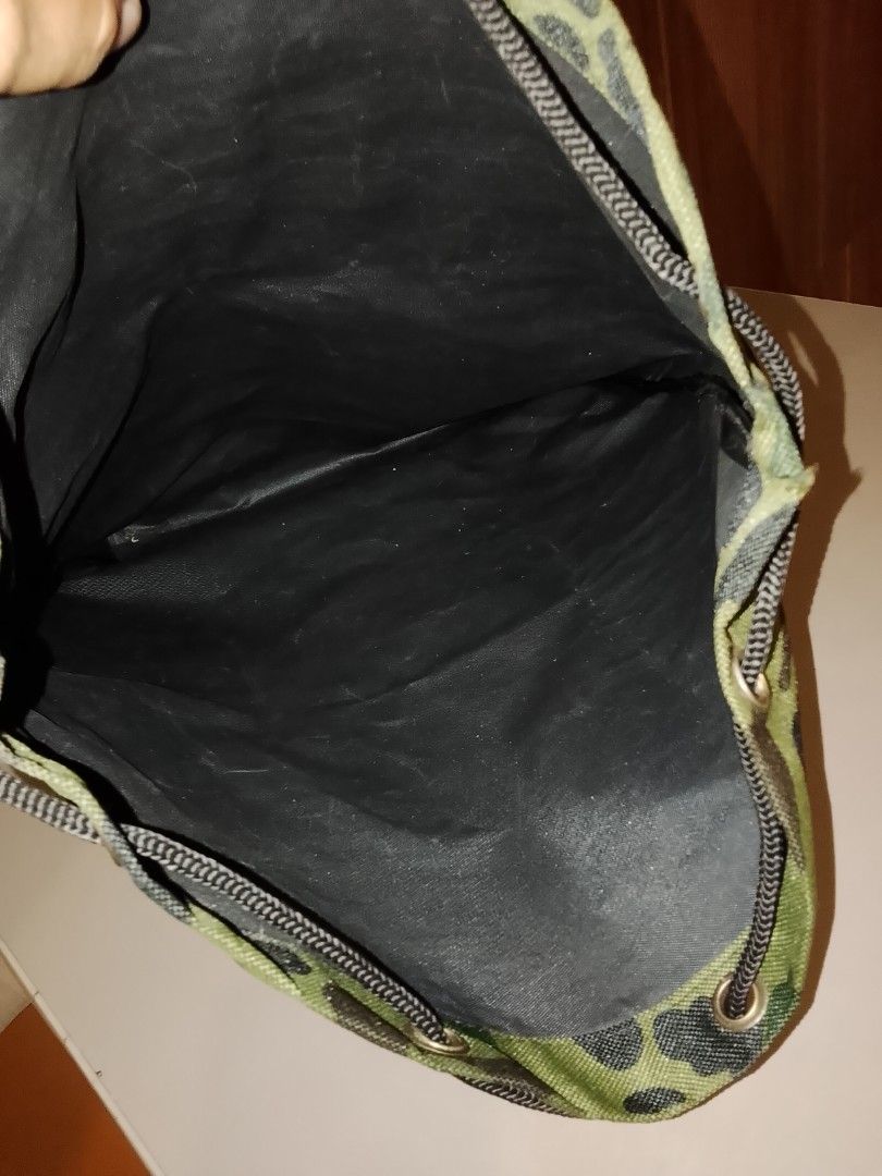 Camouflage pattern drawstring bag (Category: Backpacks) located in Manila. Submitted by newage.vintage (Listing ID 1462501699, Image 3). Description: - excellent condition -no issue - from Japan surplus - length 44cm - width 34cm.