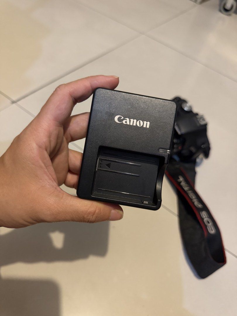 Canon 500D DSLR (Camera Body) (Category: Cameras) located in Pasig City. Submitted by jgbeautique (Listing ID 1462637181, Image 2). Description: RFS: Decluttering Ive been using my iphone in my travel photos. This is too heavy for me now. Only meetups allowed Only the camera body is for sale. The lens can be given away but there is error 01 Package includes: Canon 500D 18-55mm lens Bag Strap Battery with charger and cord All original +2300 if the