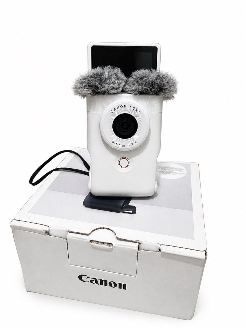 Canon Powershot V10 (Category: Cameras) located in Manila. Submitted by mijareszophia8 (Listing ID 1462610755, Image 2). Description: ★ Canon PowerShot V10 WHITE! 📸 ╰─➤ ₱15,999! FIXED ✨ COMPACT VLOGGING CAMERA! 🔥 ✨ COMPLETE SET • READY TO USE ✨ Body condition: Can pass as brand new! ✨ 📸 Specs: • 20.9MP CMOS Sensor • 4K UHD Video Recording • 19mm Wide-Angle Lens • Built-in Stereo Microphones • 3.0” Touchscreen LCD • Built-in Kickstand • Vertica
