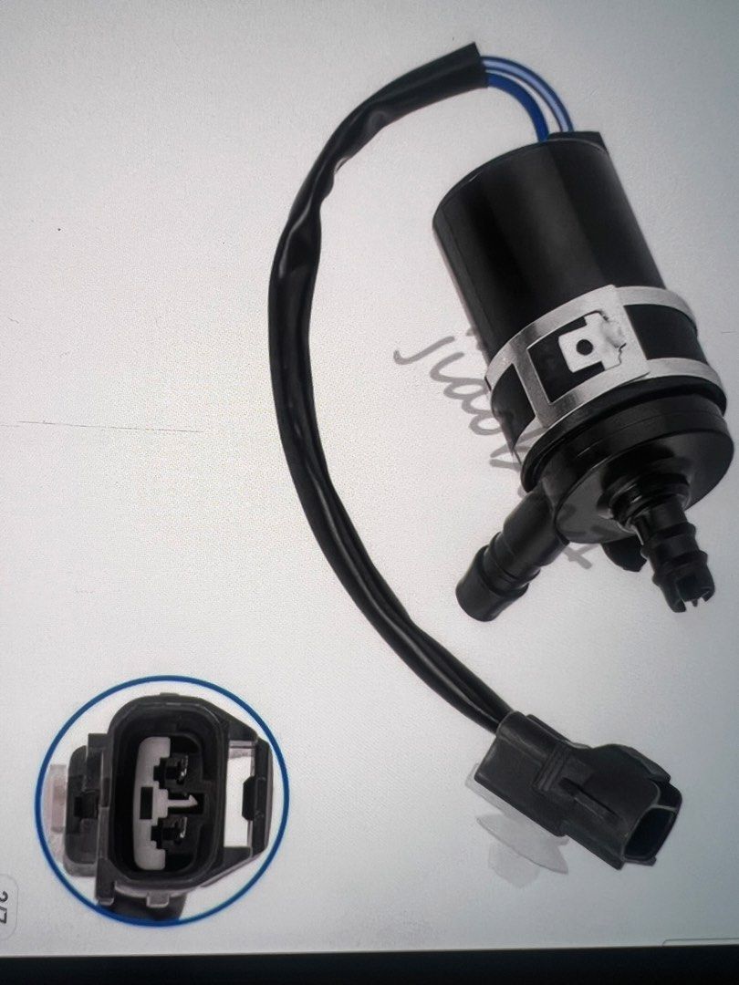 Car Windshield Washer Pump with Connector (Category: Other Automotive Parts and Accessories) located in Taguig. Submitted by mickey_stanley (Listing ID 1462507313, Image 2). Description: Brand new windshield washer pump for Mitsubishi Pajero Montero Sport L200 (2007 - 2015) - Comes complete with wiring harness and connector - Tubing features a convenient barbed fitting - Designed as a direct replacement part for easy installation - **Important:**