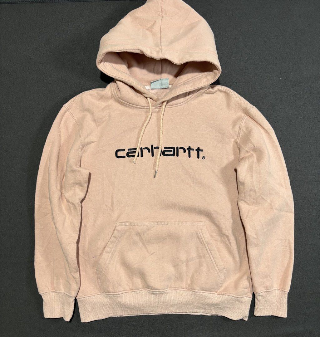 Carhartt Work In Progress Hoodie Pink Size S (Category: Coats, Jackets and Outerwear) located in Mabalacat. Submitted by _limitlessfashion (Listing ID 1462475844, Image 1). Description: - Pink Carhartt WIP hoodie - Features iconic Carhartt WIP logo on the front - Length 25 - Width 22 - Comfortable pullover style - Includes a convenient front pocket - Attached hood for extra warmth and style - Ideal for everyday casual wear - Size: Small (S).