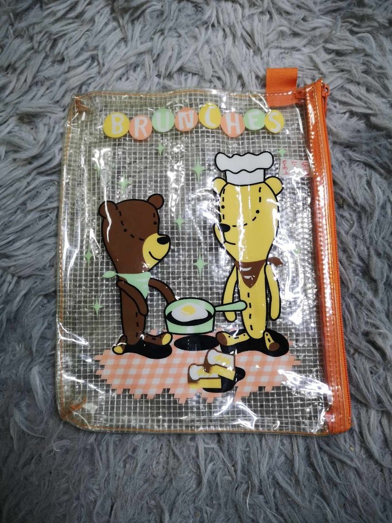Cartoon Bear Clear Mesh Zipper Pouch (Category: Stationery & School Supplies) located in Santa Cruz. Submitted by jmy_surplus.2 (Listing ID 1462672380, Image 1). Description: Size ; L - 7 W - 8.4 Color ; Orange Type ; Pouch Brand ; No brand Material ; Plastic Style ; Zipper Closure Cute Print Design Pouch LR 129 JMY 1 Batch #221.