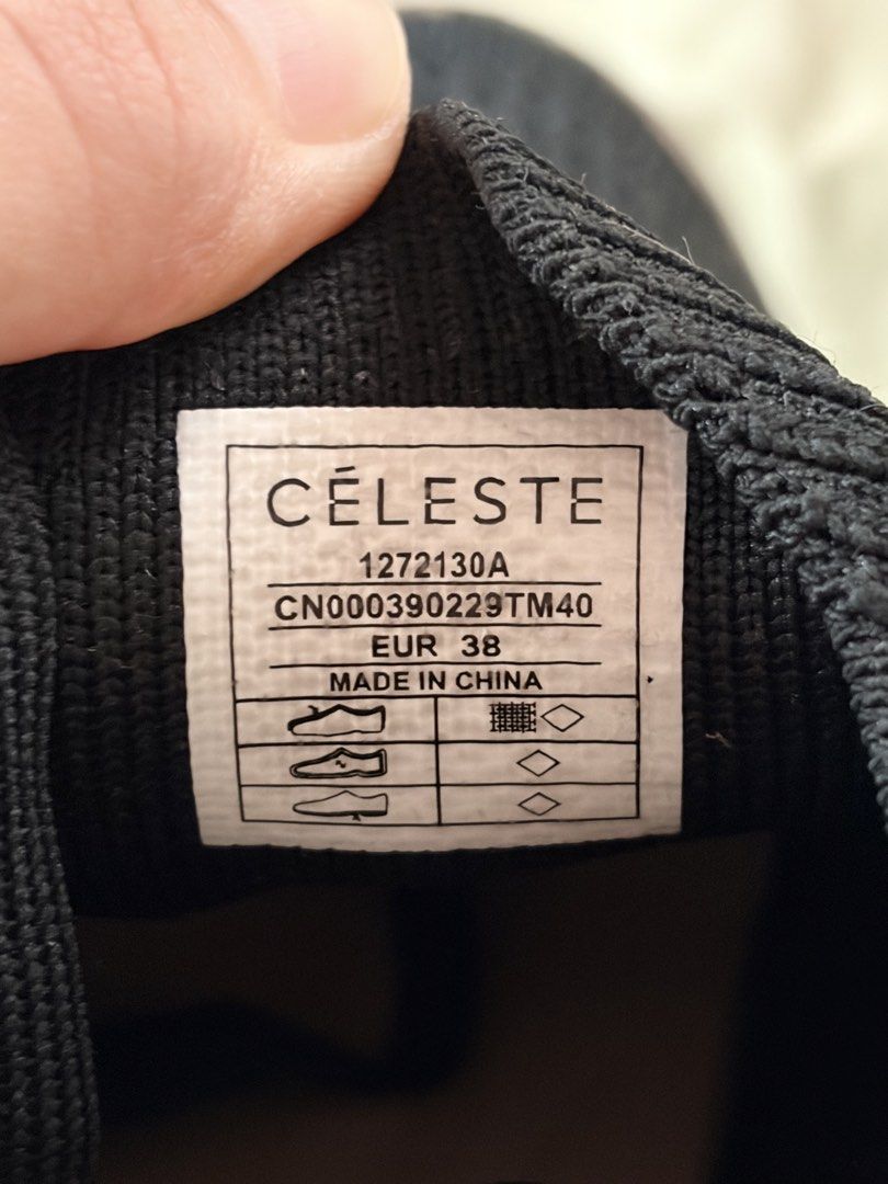 Celeste Wedge Sneakers EUR 38 (Category: Sneakers) located in Tabaco. Submitted by shae_3 (Listing ID 1462491266, Image 2). Description: - Stylish black Celeste sneakers with a hidden wedge heel. - Features the iconic Celeste logo pattern on the sides and heel. - Secure lace-up front for a perfect fit. - Size: EUR 38 - Origin: Made in China.