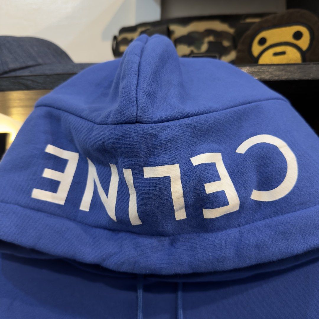 Celine Blue Hoodie (Category: Hoodies) located in Manila. Submitted by jerichomal82553 (Listing ID 1462646040, Image 3). Description: Celine Blue Hoodie 21 by 21 Good Condition Complete Tags Need Wash CLAIM 1500.