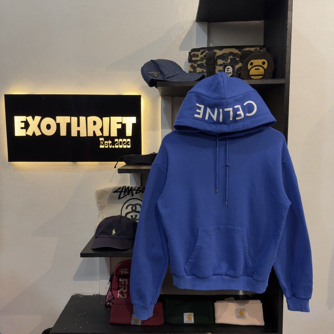 Celine Blue Hoodie (Category: Hoodies) located in Manila. Submitted by jerichomal82553 (Listing ID 1462646040, Image 1). Description: Celine Blue Hoodie 21 by 21 Good Condition Complete Tags Need Wash CLAIM 1500.