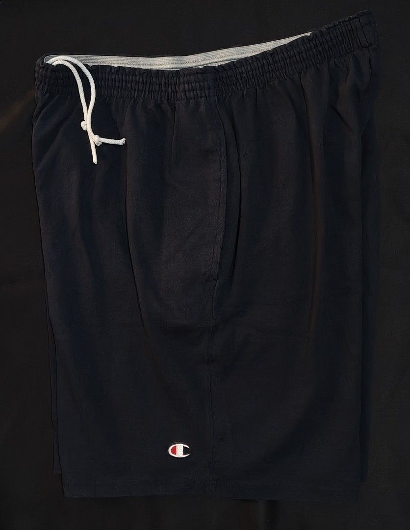 Champion Men's Black Athletic Shorts (Category: Shorts) located in Tagbilaran City. Submitted by freikfinds (Listing ID 1462493810, Image 2). Description: - Classic black Champion shorts - Elastic waistband with drawstring for a secure fit - Two convenient side pockets - Small embroidered Champion logo on the left leg - Ideal for sports activities or casual lounging - Made from comfortable and durable material -Butuan City, Mindanao .