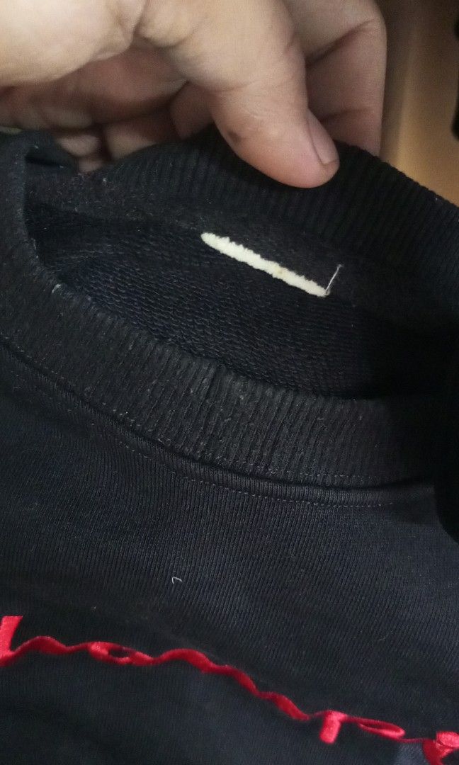 Champion sweatshirt black (Category: Coats, Jackets and Outerwear) located in Calamba. Submitted by ironjayy050812 (Listing ID 1462563127, Image 2). Description: excellent condition issue , cut necktag dimes width - 25 length - 24.