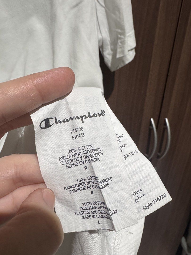 Champion white tshirt (Category: Shirts) located in Valenzuela. Submitted by shop.spark.joy (Listing ID 1462666012, Image 3). Description: L-27 in W-21 in.