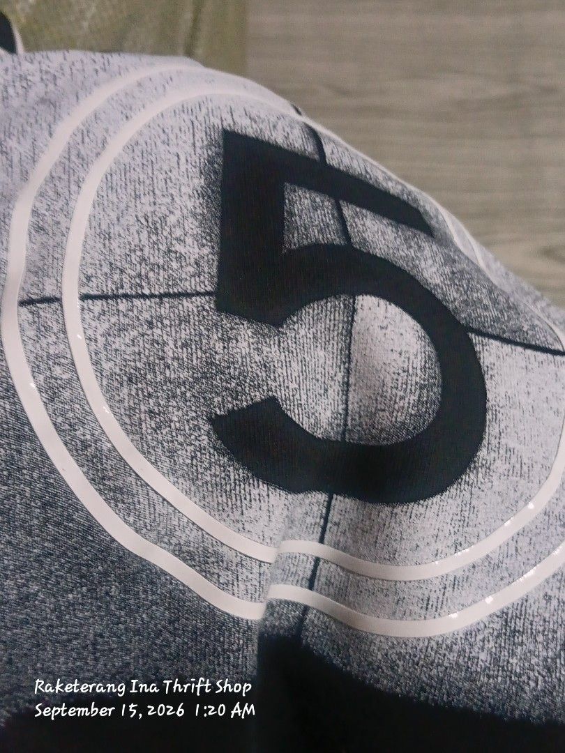 Chanel Black Tank Top with '5' Graphic (Category: Sleeveless) located in Valenzuela. Submitted by AnahThrift (Listing ID 1462461938, Image 3). Description: - Tank Top - Features iconic '5' graphic on front - Iconic Chanel CC logo detail - Made in Italy - Size: 38 - Perfect for any fashion lover.