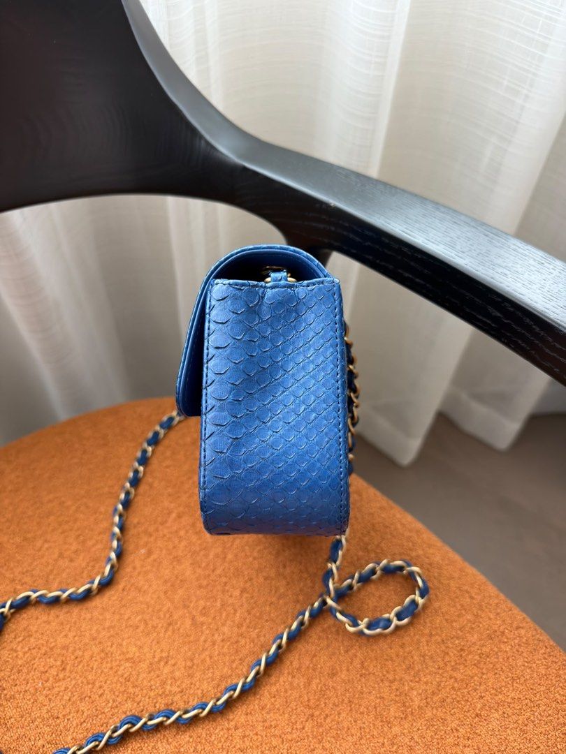 Chanel Mini Rectangular Python Flap Blue Matte gold hardware (Category: Bags & Wallets) located in Singapore. Submitted by yasfinds (Listing ID 1462508616, Image 3). Description: Chanel Mini Rectangular Python Flap Like new L20 H12 D6cm Python leather Blue Matte gold hardware Series 23 (year 2017) Comes with Authenticity card, dust bag and cites only F1309 Whats App: Kai @ +65 98263475.