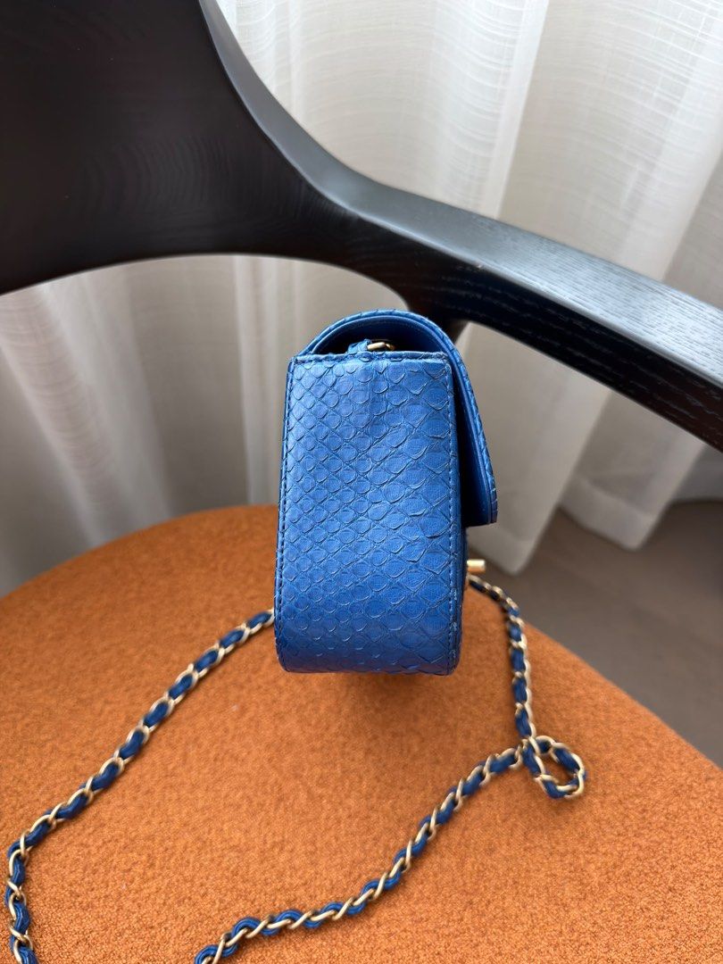 Chanel Mini Rectangular Python Flap Blue Matte gold hardware (Category: Bags & Wallets) located in Singapore. Submitted by yasfinds (Listing ID 1462508616, Image 2). Description: Chanel Mini Rectangular Python Flap Like new L20 H12 D6cm Python leather Blue Matte gold hardware Series 23 (year 2017) Comes with Authenticity card, dust bag and cites only F1309 Whats App: Kai @ +65 98263475.