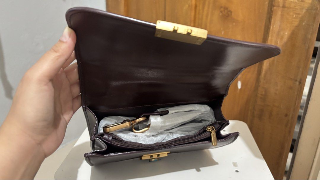 Charles & Keith Front Flap Structured Cross Body Bag (Category: Cross-body Bags) located in General Santos City (Dadiangas). Submitted by kuhreenjoy (Listing ID 1462610158, Image 3). Description: Brand New / Never been used, but has a few minor scratches from storage. Please see photos for the actual condition..