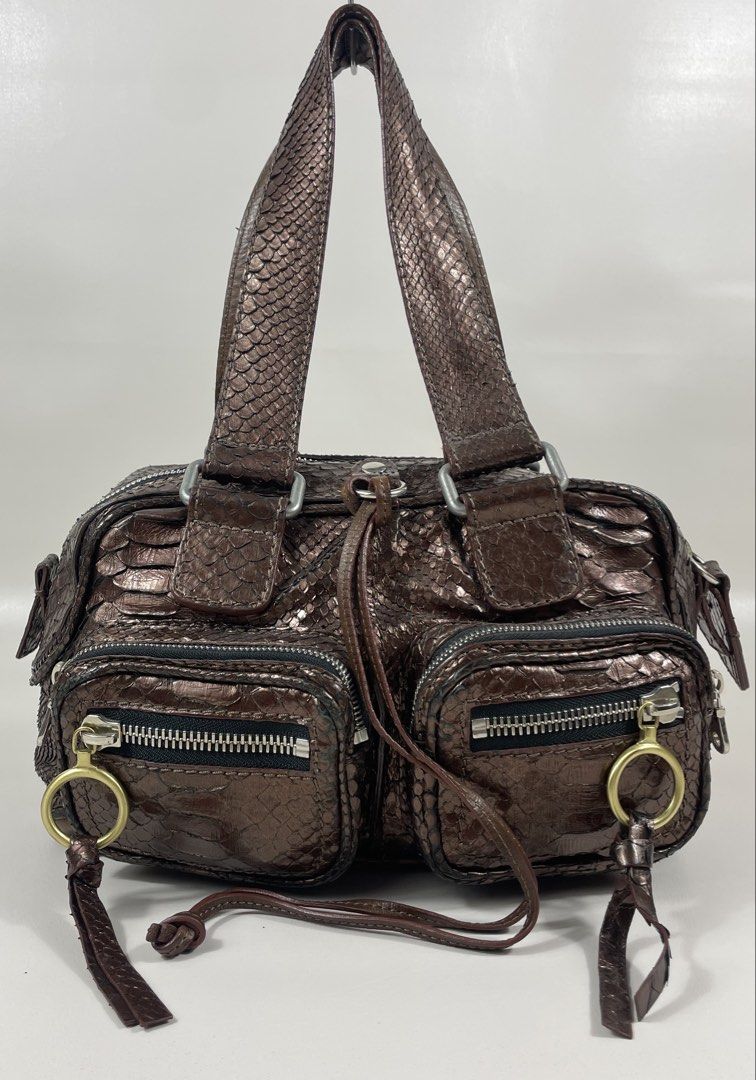 CHLOE BETTY (Category: Luxury Bags & Wallets) located in San Fernando. Submitted by larchivefeminine (Listing ID 1462646995, Image 1). Description: CHLOE BETTY IN VERY GOOD CONDITION MID 2000's MADE IN ITALY COLOR: BROWN / PHYTON ZIPPER: YKK MATERIAL:METALLIC / BRONZE PHYTON SKIN / GOLD AND SILVER , UTILITY POCKETS .
