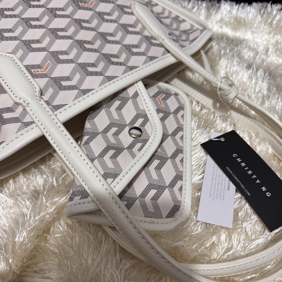Christ Ng Russo (Category: Tote Bags) located in Manila. Submitted by shophistikadabymariel (Listing ID 1462601478, Image 1). Description: Christy Ng Russo Small White Morror Copy Super Cute nito gets nyo na🤍 Rfs: Decluttering .