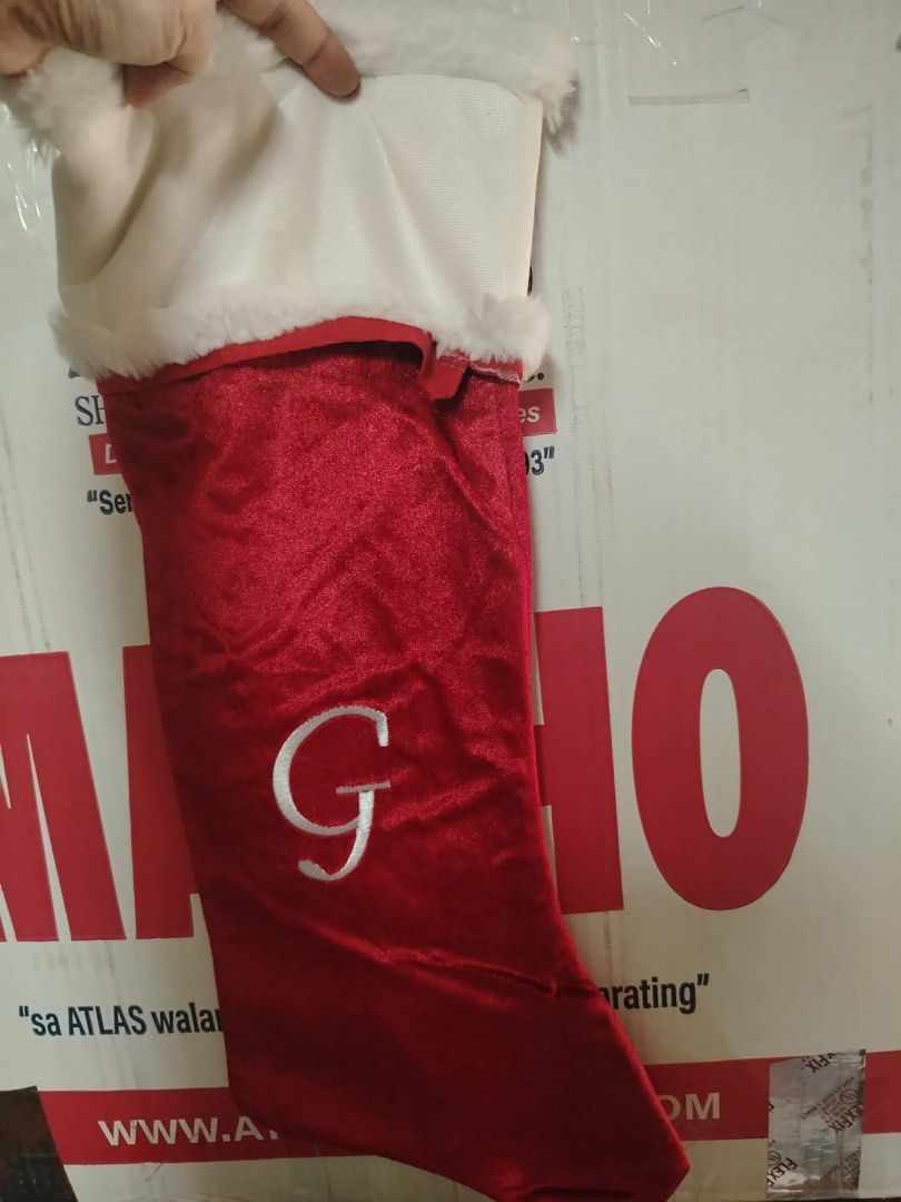 Christmas decorations socks (Category: Occasions & Party Supplies) located in Manila. Submitted by dcs_collection (Listing ID 1462448582, Image 3). Description: Used once christmas 2025 Big 3 pcs 1 plain 1 letter R 1 letter G.