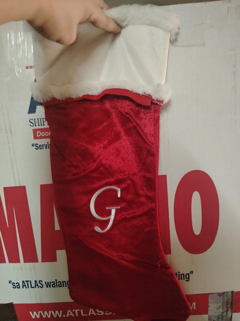 Christmas decorations socks (Category: Occasions & Party Supplies) located in Manila. Submitted by dcs_collection (Listing ID 1462448582, Image 2). Description: Used once christmas 2025 Big 3 pcs 1 plain 1 letter R 1 letter G.
