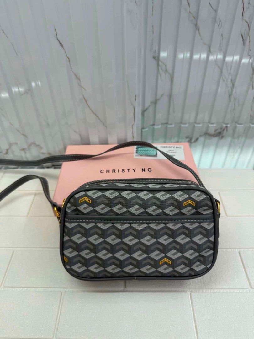 Christy Ng Sling Bag (Category: Cross-body Bags) located in Quezon City. Submitted by stuffs.hellyy (Listing ID 1462641871, Image 1). Description: with box.