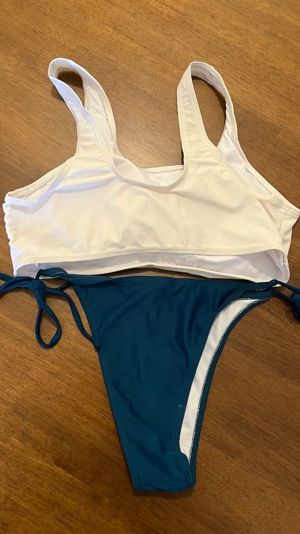 Cider Free Butterfly Tankini Set / M (Category: Bikinis & Swimsuits) located in Pasig City. Submitted by precipitation_ (Listing ID 1462508828, Image 2). Description: DETAILS • Brand: Cider • Size: M • Butterfly design • Tankini/Bikini set • Original price: ₱800 • Worn around 2x • Condition: Like New Material Composition: 82% polyester 18% spandex Stretch: High Material: Jersey Style Deets Fit Type: Regular Waist Line: Low Rise Chest Pad: Removab