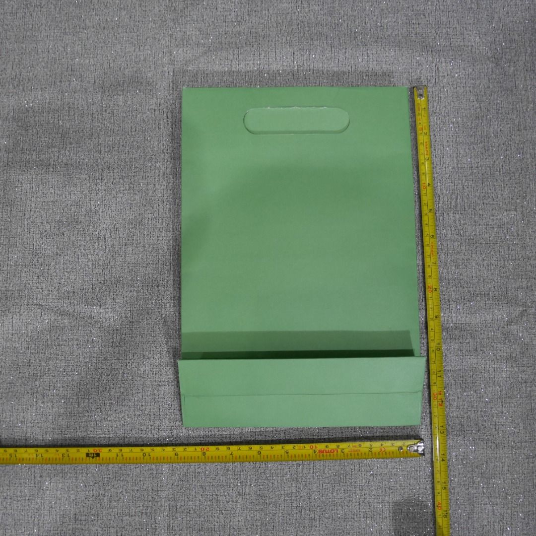 Clinique Gift Bag with tissue wrap (Category: Other Stationery & Craft) located in Valenzuela. Submitted by cletini (Listing ID 1462633075, Image 2). Description: Condition Statement (Very Important): • Authentic: Guaranteed 100% original. • Swipe photos for paper bag size • The paper bag was used only once to transport the purchased item. • Condition : Please see photos for actual item and condition. • Transparency: I have inspected the bag and 