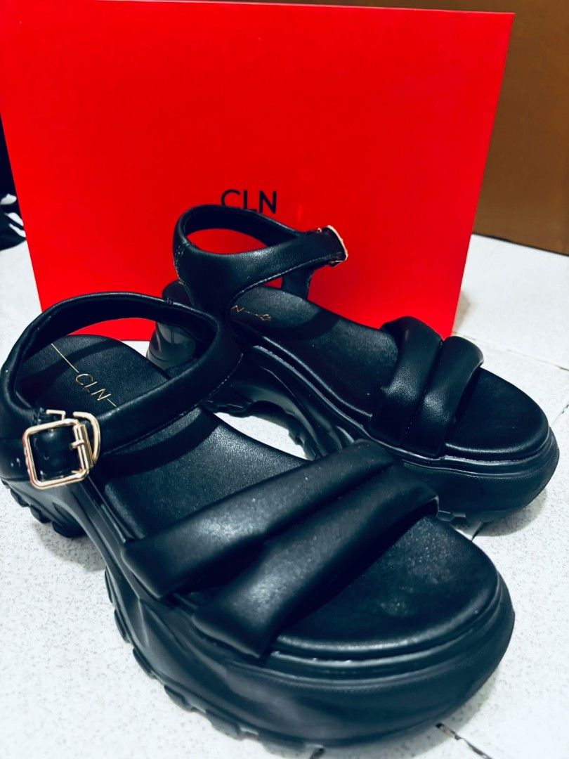 CLN size 8 Black Platform Chunky Sandals (Category: Flats & Sandals) located in Dasmarinas. Submitted by titaniumrosegold (Listing ID 1462675469, Image 3). Description: - Brand: CLN - Color: Black - Style: Platform Sandals - Sole: Chunky - Straps: Adjus table ankle strap with padding for comfort - Detail: Gold buckle - Benefits: Adds height, provides an edgy look, easy to style rfs: decluttering size 8 once lang nagamit.