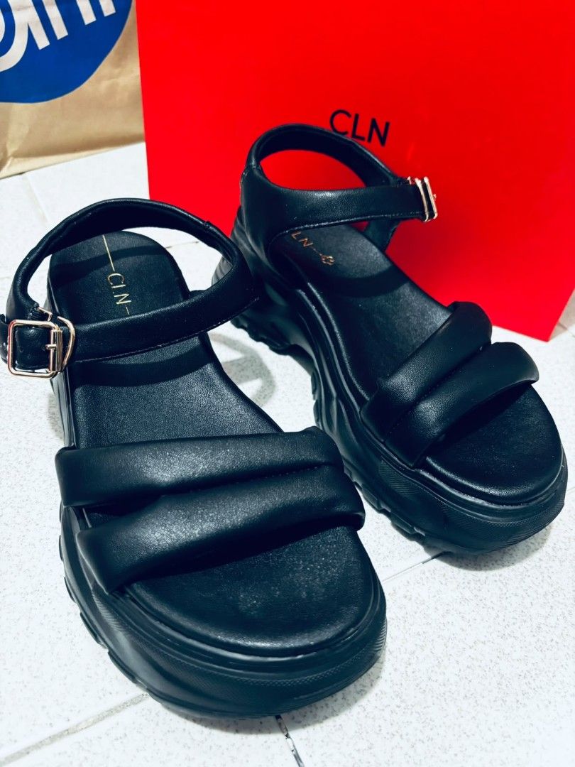 CLN size 8 Black Platform Chunky Sandals (Category: Flats & Sandals) located in Dasmarinas. Submitted by titaniumrosegold (Listing ID 1462675469, Image 1). Description: - Brand: CLN - Color: Black - Style: Platform Sandals - Sole: Chunky - Straps: Adjus table ankle strap with padding for comfort - Detail: Gold buckle - Benefits: Adds height, provides an edgy look, easy to style rfs: decluttering size 8 once lang nagamit.