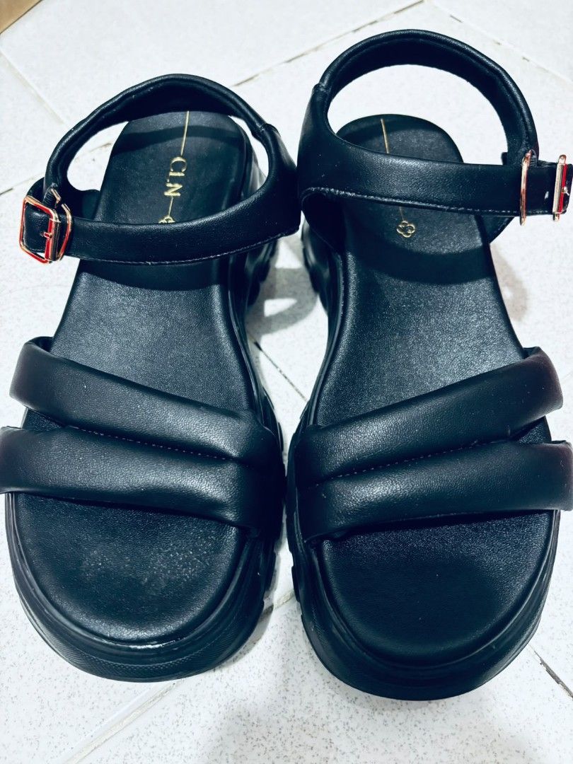 CLN size 8 Black Platform Chunky Sandals (Category: Flats & Sandals) located in Dasmarinas. Submitted by titaniumrosegold (Listing ID 1462675469, Image 2). Description: - Brand: CLN - Color: Black - Style: Platform Sandals - Sole: Chunky - Straps: Adjus table ankle strap with padding for comfort - Detail: Gold buckle - Benefits: Adds height, provides an edgy look, easy to style rfs: decluttering size 8 once lang nagamit.