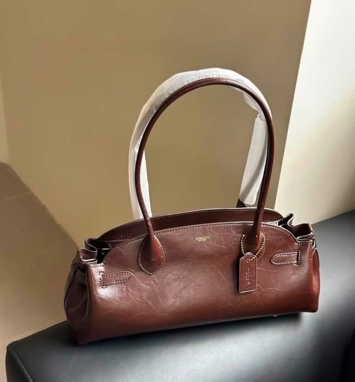 COACH EMPIRE CARRY ALL BAG (Category: Luxury Bags & Wallets) located in Pasig City. Submitted by titalana2011991 (Listing ID 1462540983, Image 1). Description: BRANDNEW PAPER BAG/ DUST BAG/ TAG NO MEET UP PAY AS U ORDER.