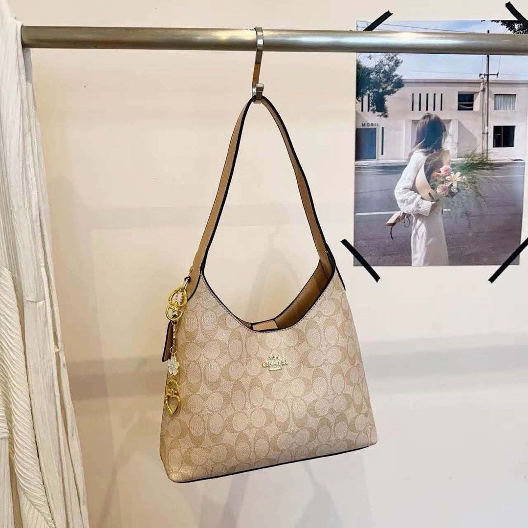 Coach Med Tote Bag (Category: Shoulder Bags) located in Manila. Submitted by lovely_girl18 (Listing ID 1462623882, Image 2). Description: ✨Coach Med. Totebag✨ Got New Stock!!! • no box • 13inches • with dustbag and serial number.