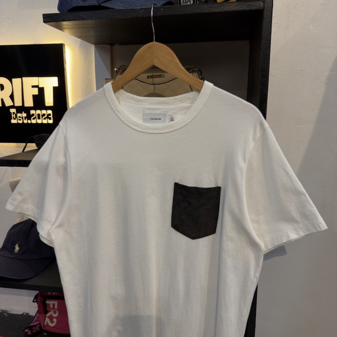 Coach Monogram Pocket White Shirt (Category: Tshirts & Polo Shirts ) located in Manila. Submitted by jerichomal82553 (Listing ID 1462551868, Image 2). Description: Coach Monogram Pocket White Shirt 21 by 30 Good Condition Complete Tags Need Wash CLAIM 1K.