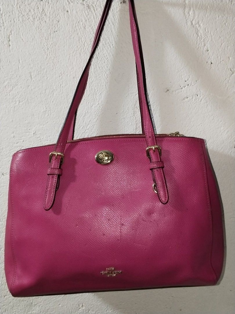 Coach Pink Leather Tote Bag (Category: Shoulder Bags) located in Manila. Submitted by bagelyascollection (Listing ID 1462612320, Image 1). Description: - Authentic Coach pink leather tote bag - Elegant gold hardware details - Secure zipper closure - Spacious interior with multiple compartments - Made in Vietnam.