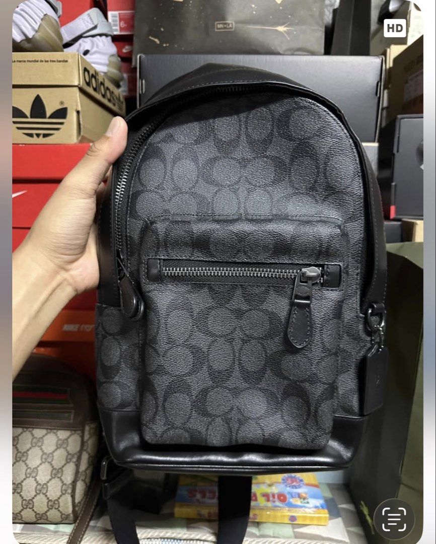 Coach West Pack Sling Crossbody Bag (Category: Sling Bags) located in Makati City. Submitted by oliverailene (Listing ID 1462464567, Image 1). Description: Coach West Pack in Signature Canvas Style Number: F2447 Mall SRP : P28,000 Clearing out some items! Selling my authentic Coach signature canvas bag. Used with care, but full disclosure: there’s a minor scuff on the bottom leather corner (highlighted clearly in the last photo). Aside from that,
