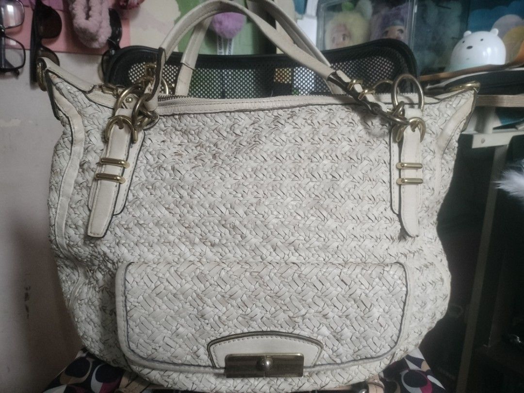 Coach Woven Straw Leather Trim Shoulder Bag (Category: Shoulder Bags) located in Cavite. Submitted by annasoriano1982 (Listing ID 1462548887, Image 1). Description: coach kristine banig type vintage napo pls manage expectation with some signs of use 18" inches width 14" inches height no sling po ito pwede pang travel or pang beach.