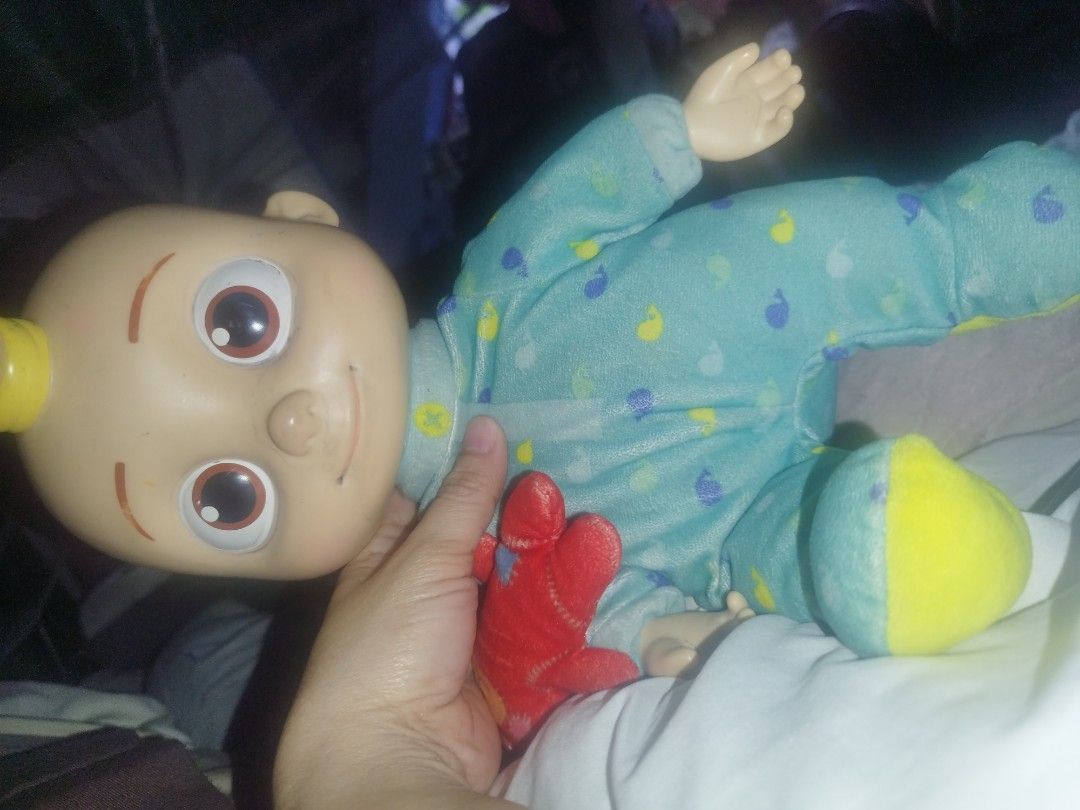 Cocomelon JJ Doll in Pajamas (Category: Infant Playtime) located in Manila. Submitted by leivon (Listing ID 1462626637, Image 1). Description: - Cocomelon JJ Doll - Adorable blue pajamas with whale prints - Soft body for cuddles - Durable plastic head - Yellow accents on pajama feet - Ideal gift for Cocomelon enthusiasts.